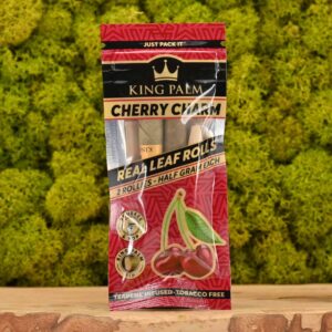 Paquete de King Palm Rollies x2 sabor cherry con diseño natural.